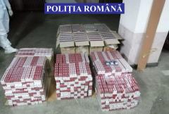 Șofer prins drogat, fără permis, la valonul unei mașini cu numere false, plină cu țigări de contrabadă