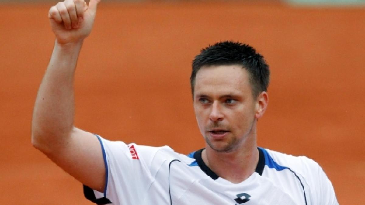 Soderling l-a trimis acasă pe Federer, campionul en-titre!