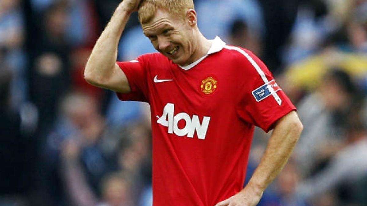 Scholes se retrage.