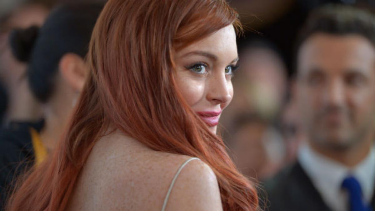 Lindsay Lohan bea doi litri de votcă pe zi