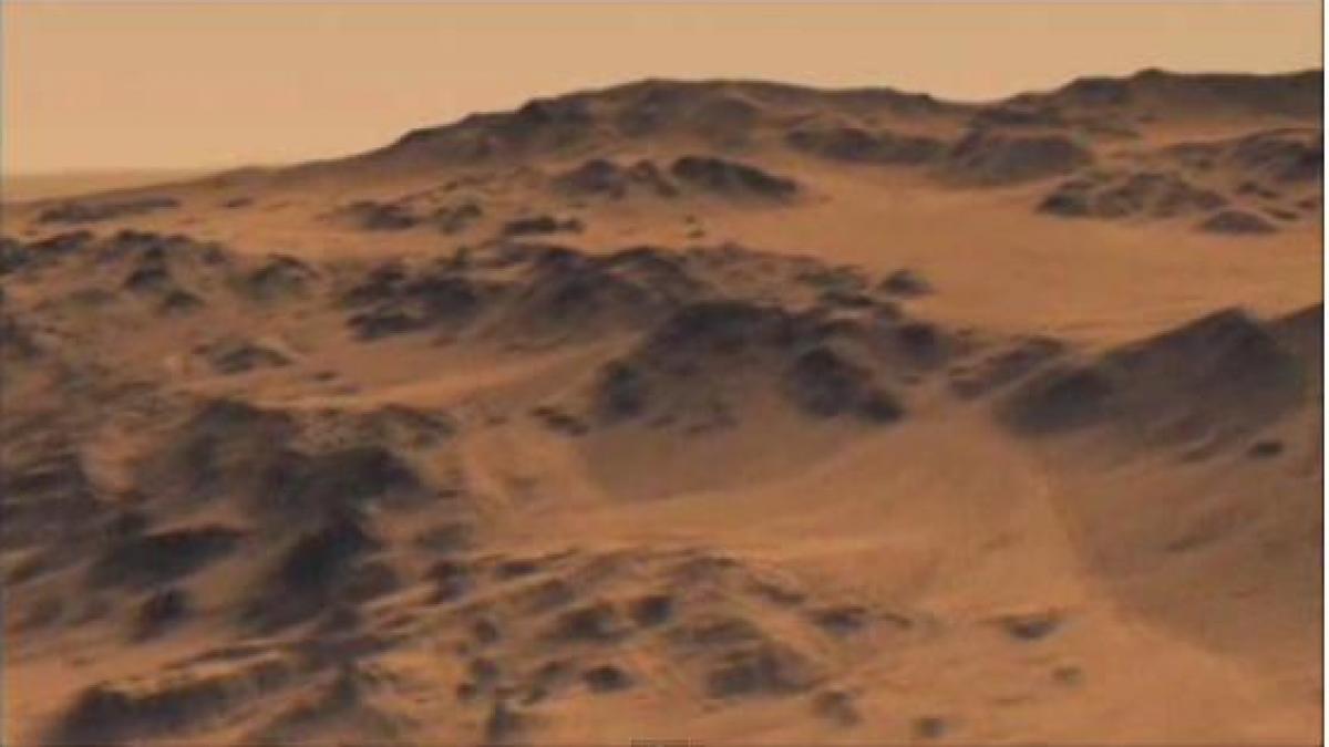 DESCOPERIRE UIMITOARE. NASA a găsit un crater uriaş pe Marte. Ce se ascunde în spatele acestui crater VIDEO