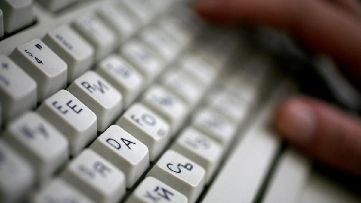 Doi hackeri români, acuzaţi de americani de apartenenţă la mafie