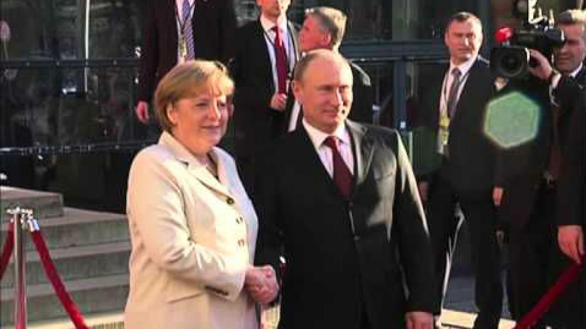 Putin i-a asigurat pe Merkel şi Hollande că va respecta alegerea poporului ucrainean