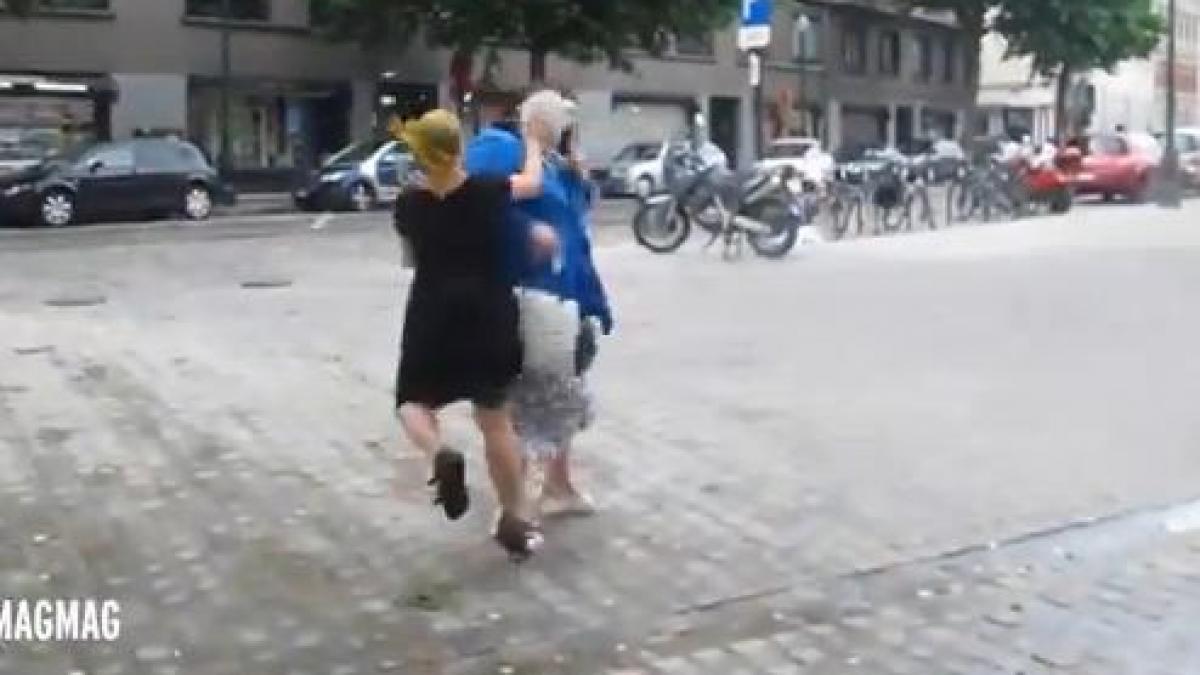 belgia maggie de block ministrul sanatatii atacata in public cu placinte video