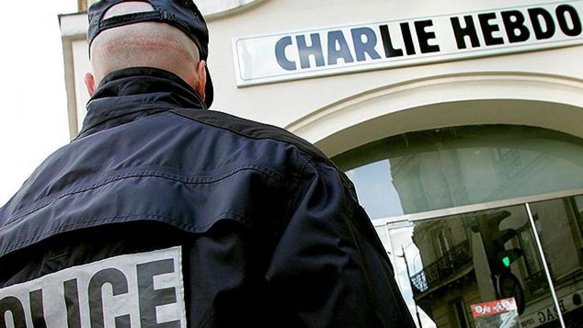 ARESTATĂ după ce a republicat caricaturi din Charlie Hebdo