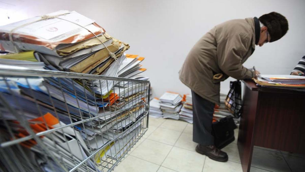 Percheziţii într-un caz de fraude cu dosare de pensionare 