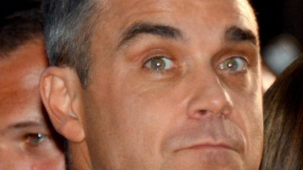 Euro 2016. Pronosticul lui Robbie Williams pentru Franța - România