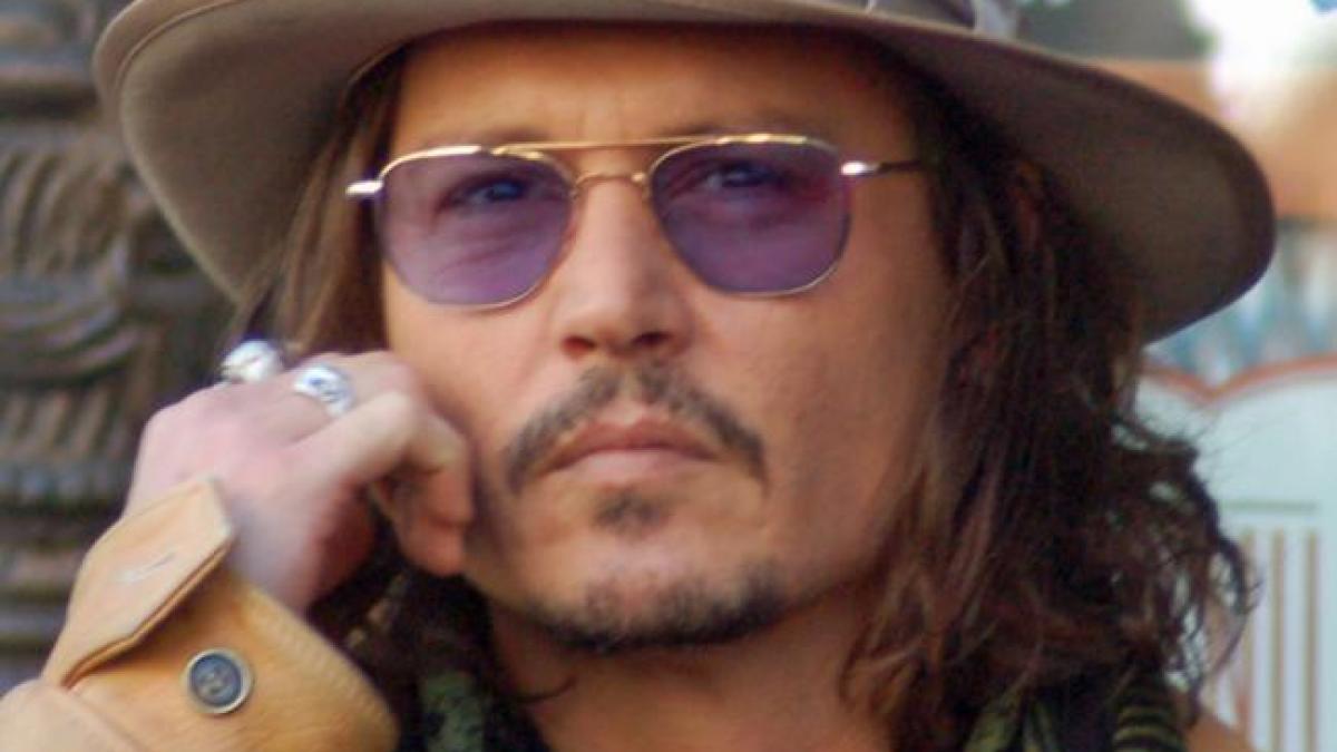 Acuzat de violenţă conjugală, Johnny Depp este apărat de romanciera J. K. Rowling 