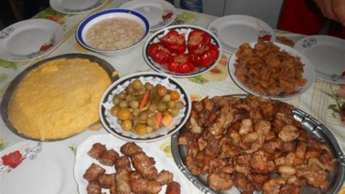 În Ajunul Crăciunului, bănăţenii se cinstesc cu ''pomana porcului'' 
