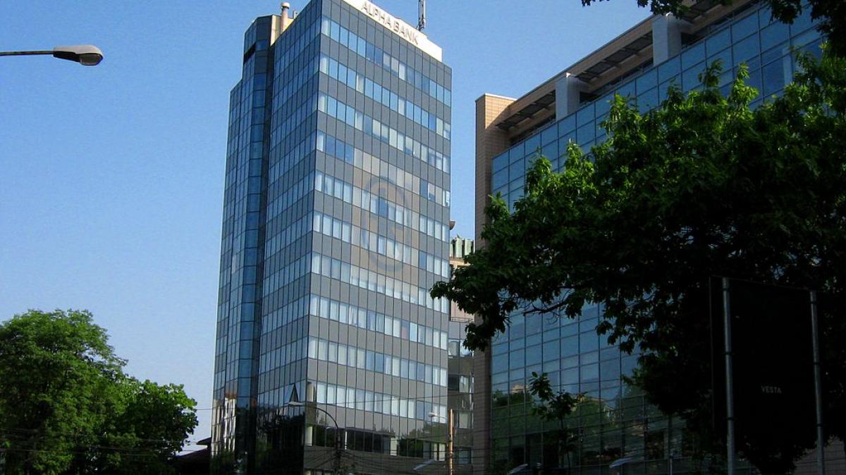 Alpha Bank a revenit pe pierderi în T4