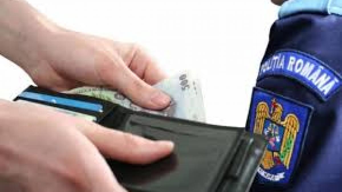 Ilfov: Polițist, reținut când primea 1.000 de lei să ajute o persoană într-un dosar