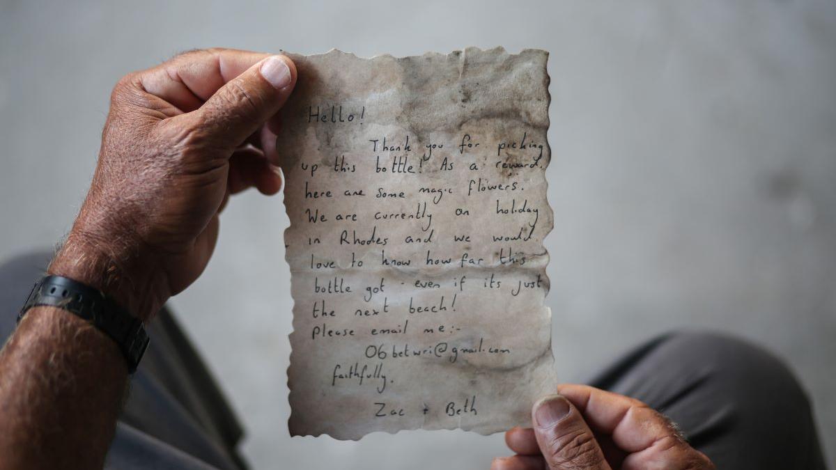 A 132-year-old message was found in a bottle mounted on the wall of a lighthouse in Scotland. What is the content of the discovery?