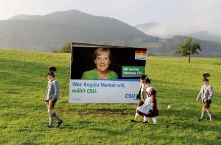 Merkel, un nou mandat