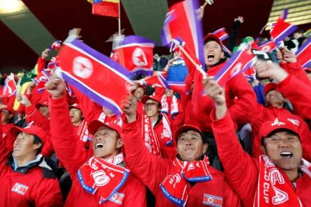 Fanii nord-coreeni au fost recrutaţi de guvernul de la Phenian
