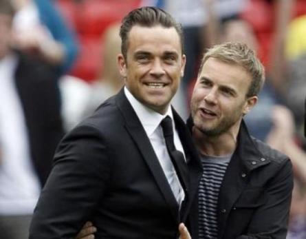 Robbie Williams a revenit la Take That