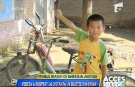 Primele imagini cu micuţul chinez adoptat de Andreea Marin
