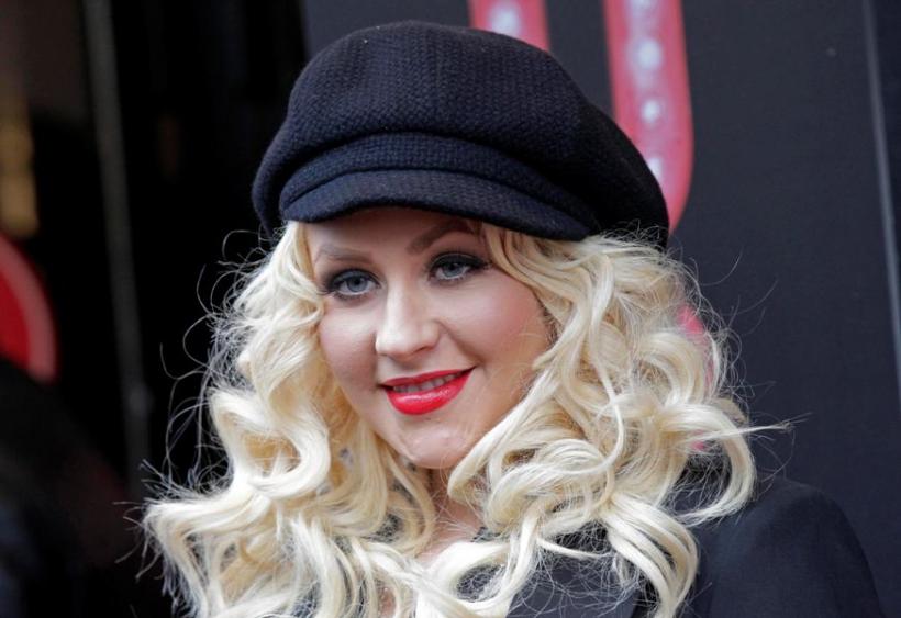 Christina Aguilera a împărţit locuinţa atât cu fostul soţ, cât şi cu actualul iubit