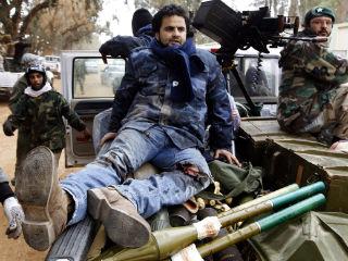 Gaddafi către Occident: “Veţi regreta orice amestec. Libienii sunt pregătiţi să moară pentru mine!”