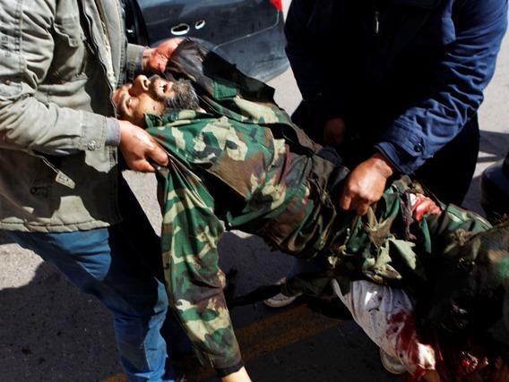 Mercenarii lui Gaddafi primesc 350 de euro pentru fiecare cadavru adus la Tripoli
