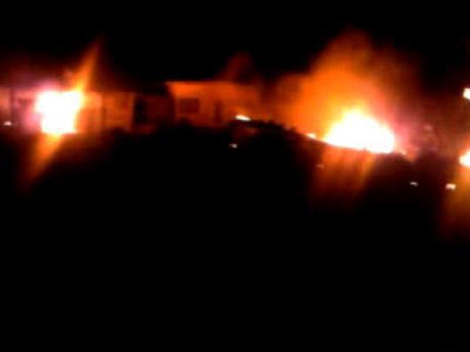 Noi imagini cu vila lui Osama bin Laden în flăcări