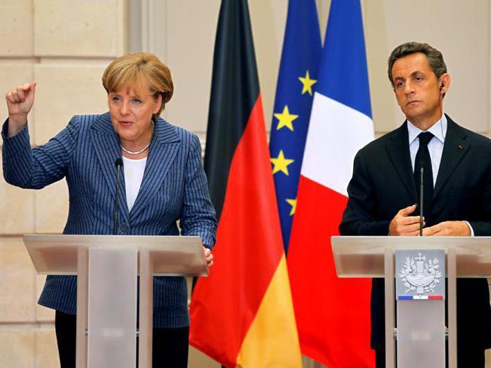 Sarkozy şi Merkel dau asigurări că Grecia va rămâne în zona euro