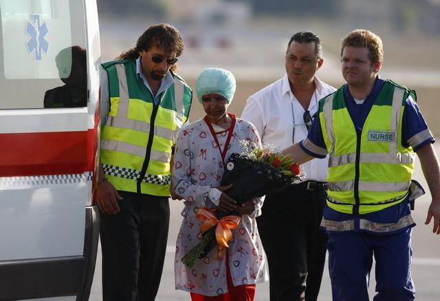 Bona mutilata a familiei Gaddafi va fi tratată în Malta. Galerie FOTO 1562394