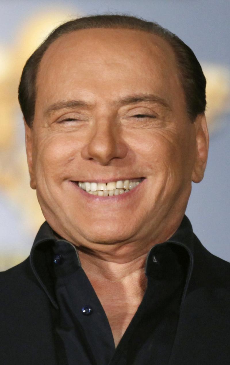 Berlusconi aranja întâlniri cu "fetiţe dulci" în timpul unei întâniri cu Tăriceanu, venit să ia deţinuţii români din Italia