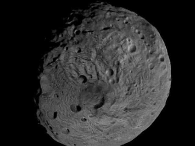 Asteroid-gigant studiat de o misiune NASA. Pe Vesta se află un munte pe lângă care Everestul pare un muşuroi de furnici (VIDEO)
