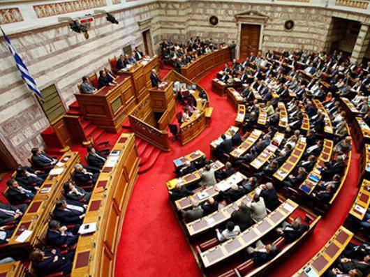 Parlamentul grec a adoptat noi măsuri de austeritate. Luptele de stradă ar putea continua