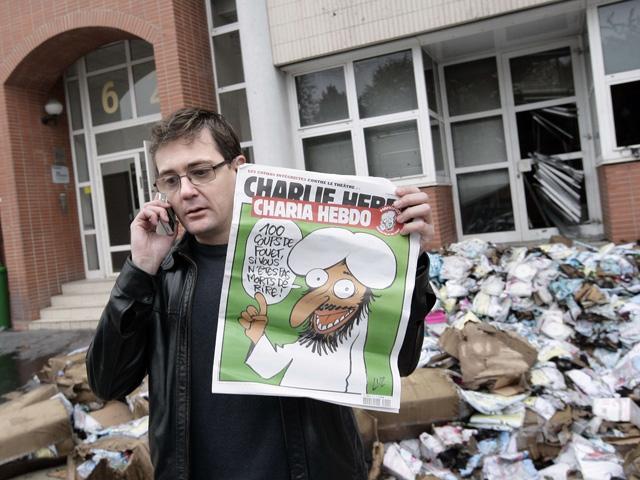 Simpatizanţi musulmani au incendiat redacţia săptămânanului de satiră francez Charlie