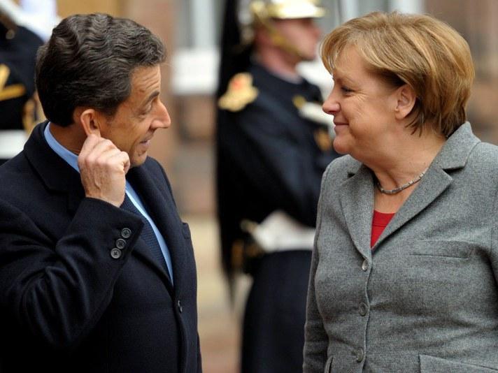 Merkel şi Sarkozy vor să creeze un spaţiu Schengen fiscal în zona euro