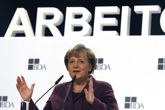 Merkel respinge definitiv soluţiile tipăririi de bani sau emisiei de eurobonduri