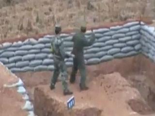 Iată-l pe cel mai prost soldat din lume! Un militar chinez n-a putut arunca la câţiva metri o grenadă amorsată (VIDEO)