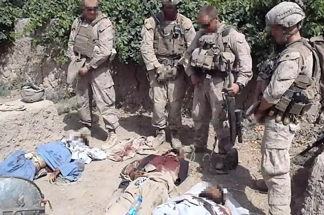 Noi fotografii cu soldaţi americani pozând lângă cadavrele afganilor au fost publicate de presa americană