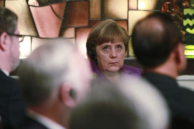 Merkel, atacată pentru imixtiunile în politica românească