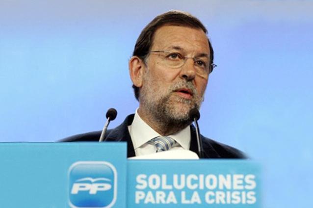 Spaniolii şi-au retras banii din bănci şi fug din ţară de frica crizei