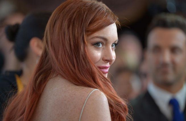 Charlie Sheen i-a oferit actriţei Lindsay Lohan 100.000 de dolari