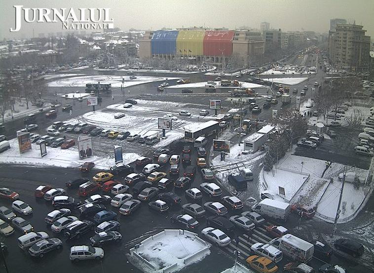 Iarna a ajuns şi în Capitală. Vezi cum se circulă după prima ninsoare, în Bucureşti - Imagini LIVE pe webcam jurnalul.ro