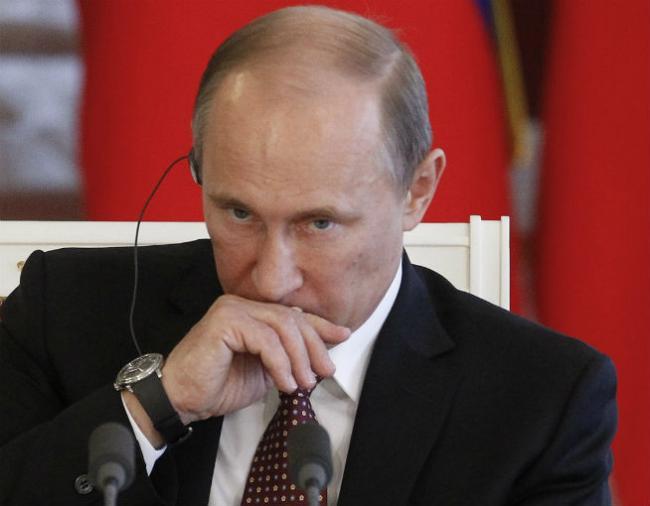 Putin: Acuzaţiile privind folosirea de arme chimice de către regimul sirian, o 'absurditate totală'