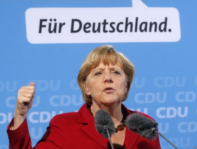 Merkel a lansat negocierile pentru formarea unei mari coaliţii guvernamentale