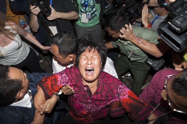 Rudele victimelor zborului MH370, protest la Ambasada Malaysiei de la Beijing: &quot;Guvernul malaysian este un mincinos!&quot;