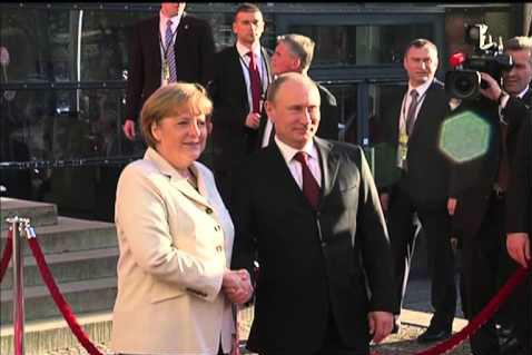 Putin i-a asigurat pe Merkel şi Hollande că va respecta alegerea poporului ucrainean