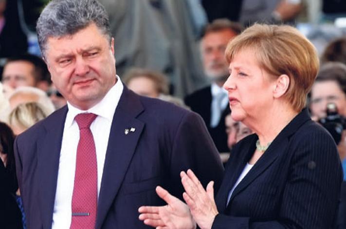 Angela Merkel, convorbire telefonică cu Petro Poroşenko. Preşedintele ucrainean, pregătit de un armistiţiu 'bilateral'