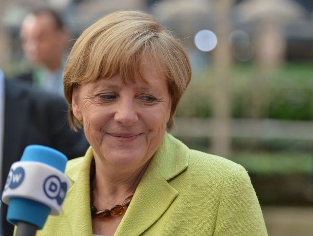 Merkel schimbă prefixul: liderii europeni au cadorisit-o cu flori şi şampanie la împlinirea vârstei de 60 de ani