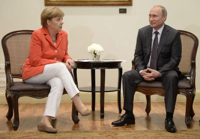 Merkel şi Putin, plan secret pentru a pune capăt crizei din Ucraina