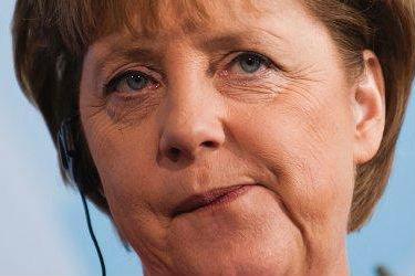 Merkel şi Poroşenko cer oprirea livrărilor de arme din Rusia în Ucraina