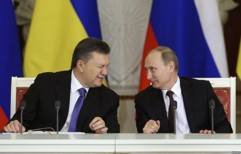 Putin mărturisește că l-a ajutat pe Ianukovici să fugă, după protestele violente din Ucraina