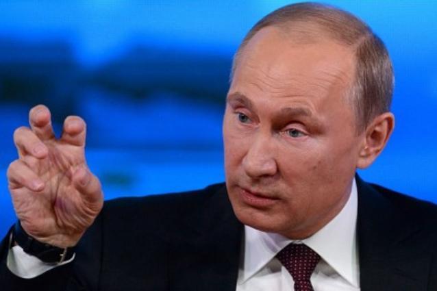 Putin: Occidentul încearcă &quot;să pună ursul rus în lanţ şi să-i smulgă colţii şi ghearele&quot;