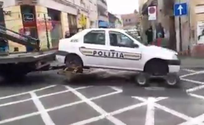 VIDEO. Masina Politiei ridicata pentru parcare neregulamentara!