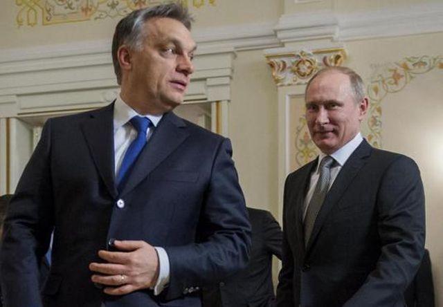 Putin la Budapesta: Unii cu fluieratul, alţii cu semnatul